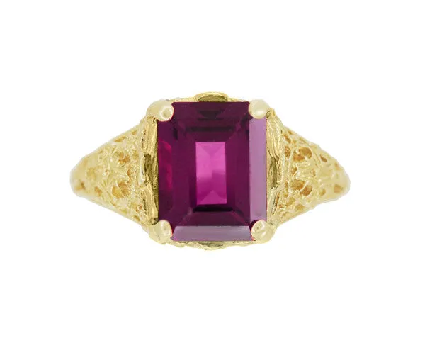 Edwardian Filigree Emerald Cut Rhodolite Garnet Engagement Ring in 14 Karat Yellow Gold
