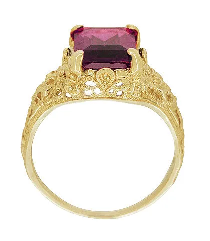 Edwardian Filigree Emerald Cut Rhodolite Garnet Engagement Ring in 14 Karat Yellow Gold