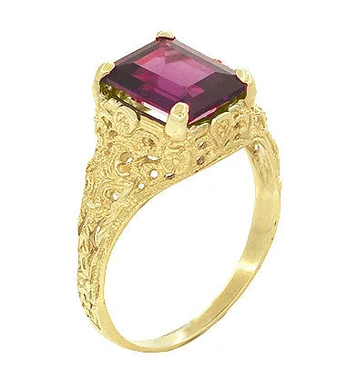 Edwardian Filigree Emerald Cut Rhodolite Garnet Engagement Ring in 14 Karat Yellow Gold
